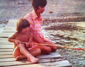 My first fishing rod age 3, perfect rod positioning and hawk like focus on the float!